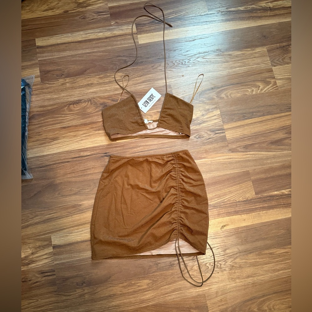 New with tags, 12th tribe matching crop top and skirt set, size small